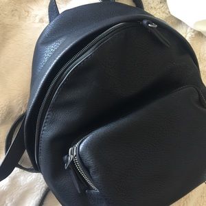Black faux leather mini backpack
